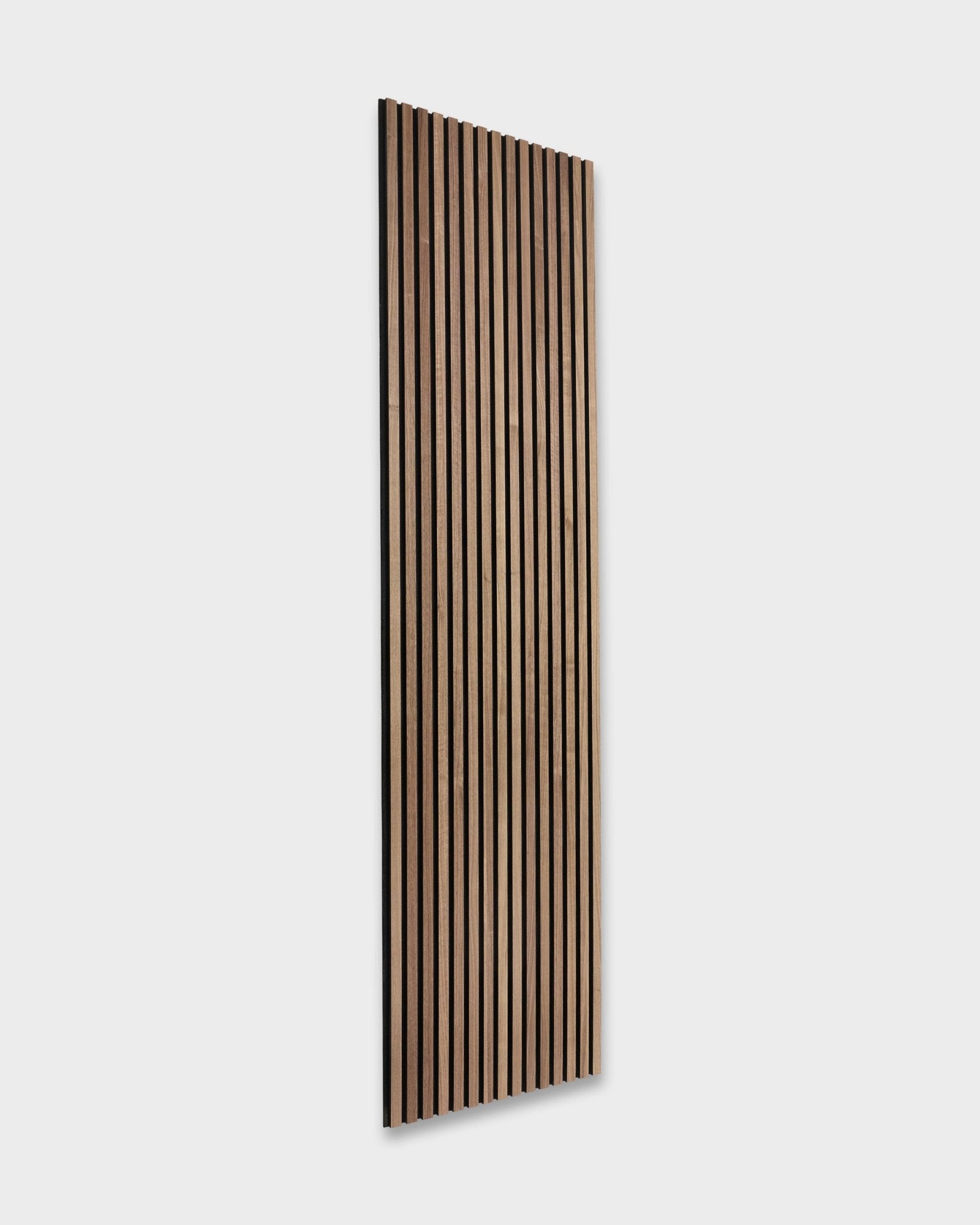 WoodUpp Akupanel acoustic panel in walnut, 300 x 60 cm; rectangular Nordic-style slatted design with vertical wood strips on a light gray felt backing.