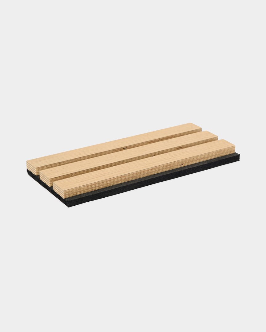 Three parallel WoodUpp Akupanel acoustic panels in Natural Oak, firerated B,s1-d0, mounted on a black base, displayed against a white background.