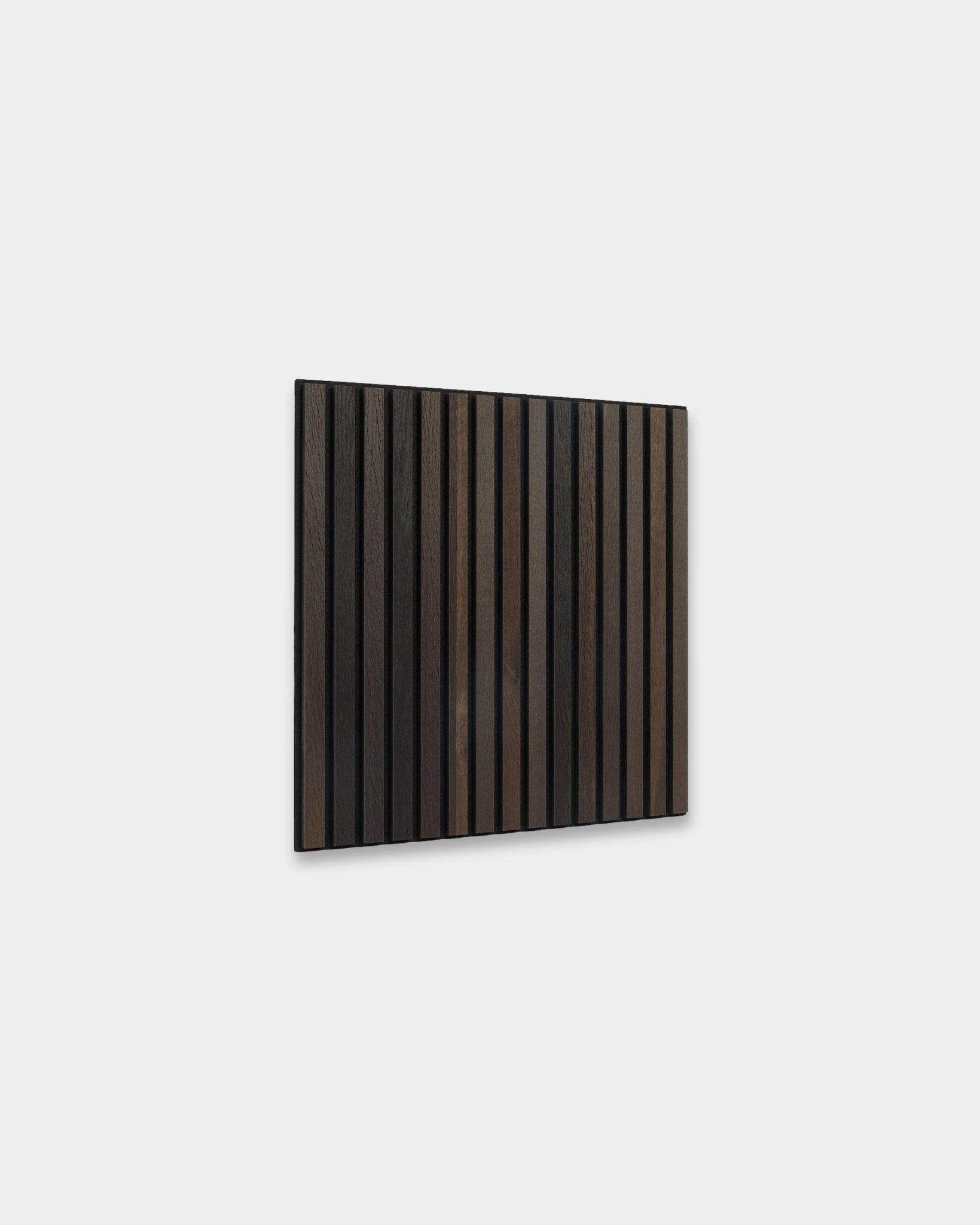 WoodUpp Akupixel acoustic panel in Smoked Oak, 60x60cm, with vertical black and dark brown slats in a Nordic-inspired, minimalist design.