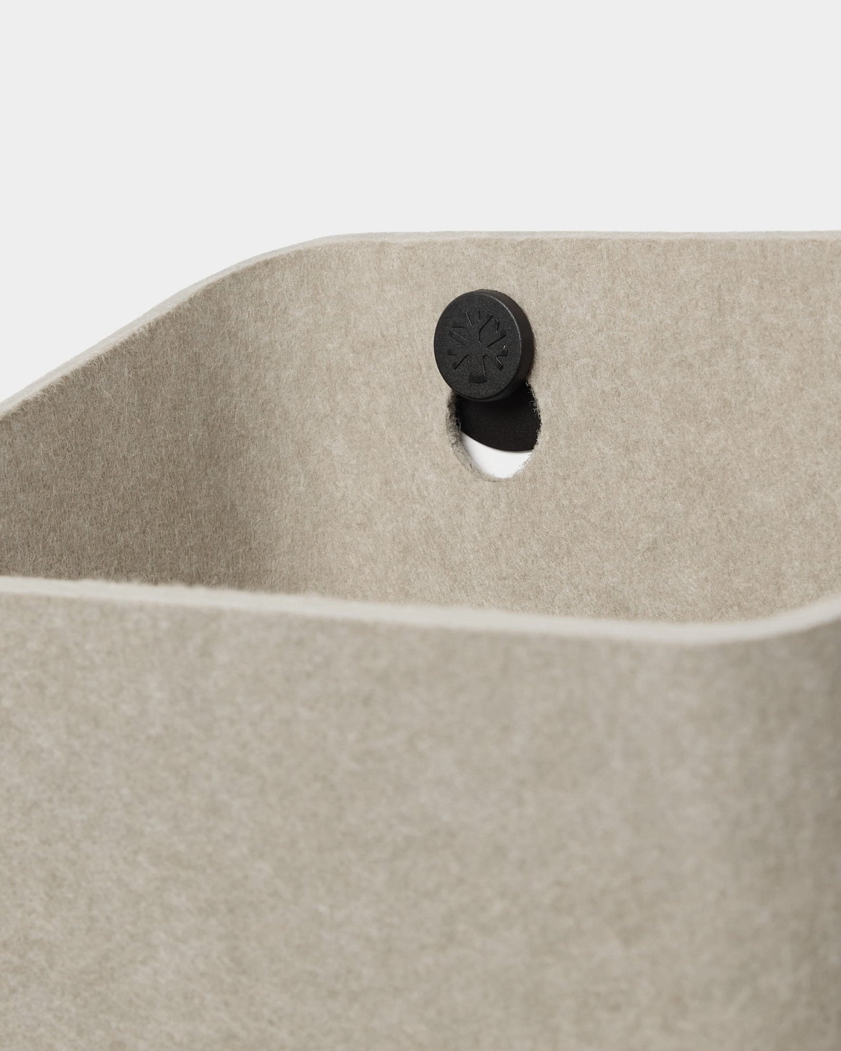 Close-up of WoodUpp Dupps | Light storage bin, showing black button detail and nylon brackets near a circular cutout. Sold as a 10-piece pack.