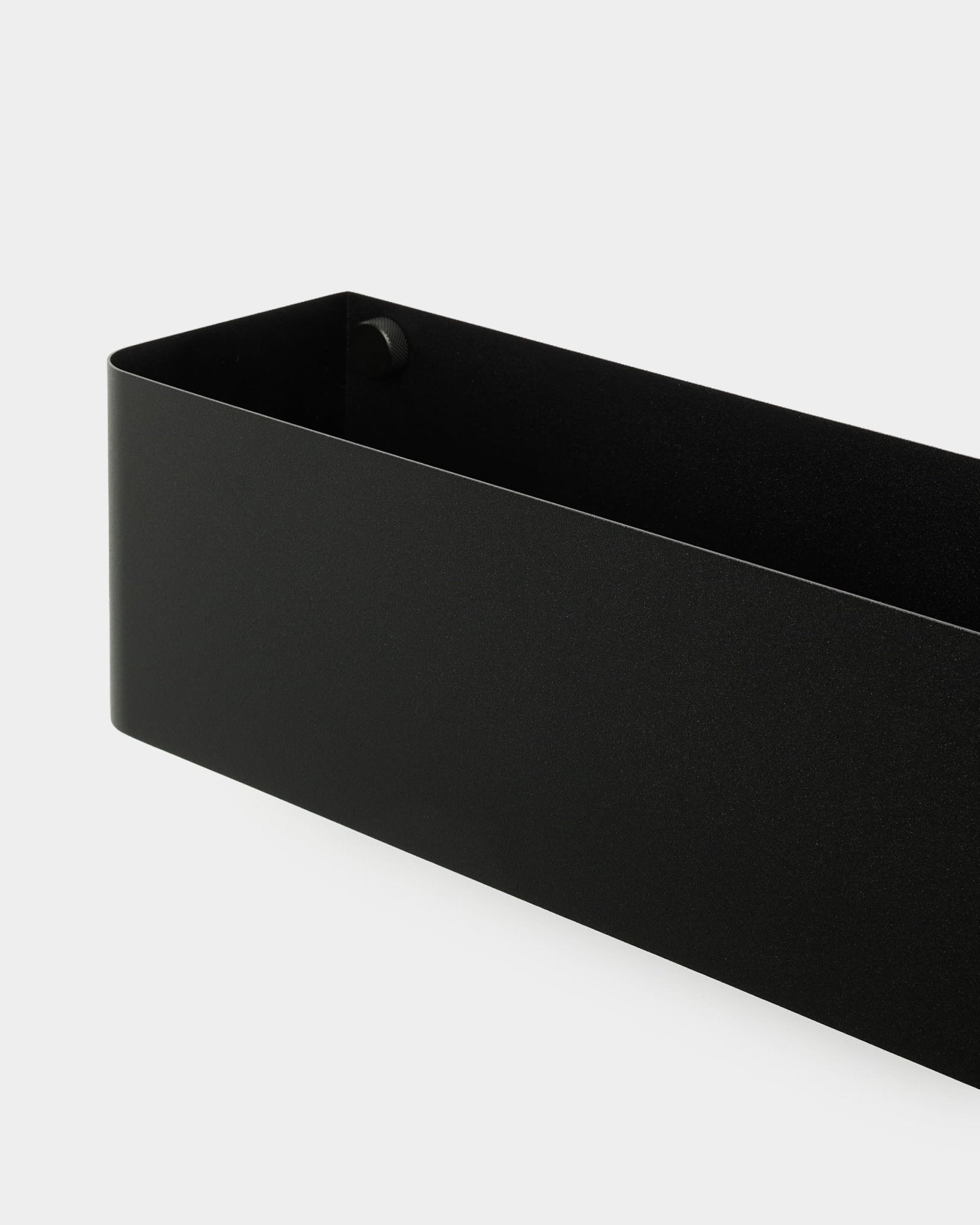 The Norr Plant Box by WoodUpp, 47.9 cm in black with smooth curved edges, placed against a plain white background.