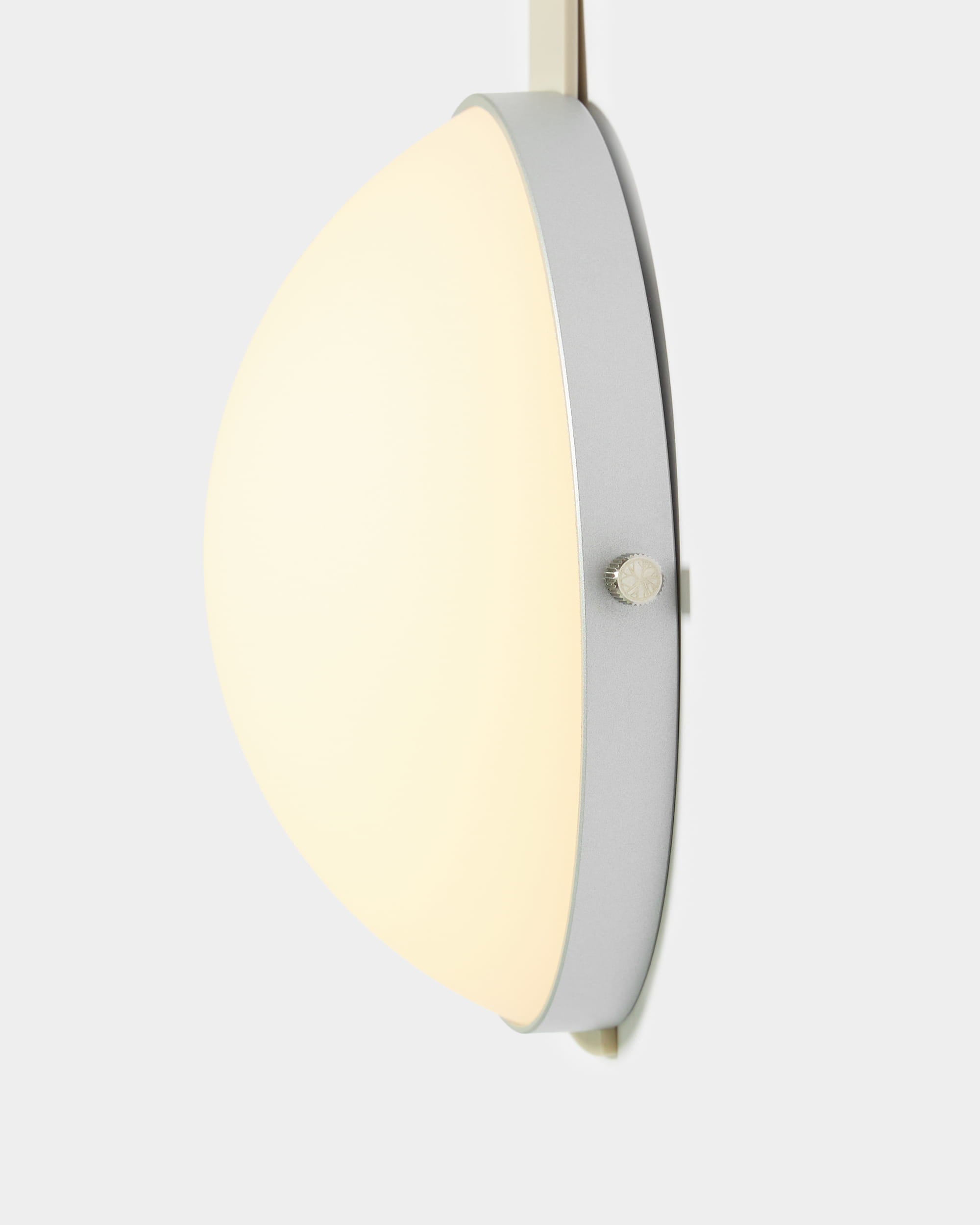 Vala Portable LED Lamp by WoodUpp with half-sphere frosted glass shade and silver frame, displayed on a light gray background.