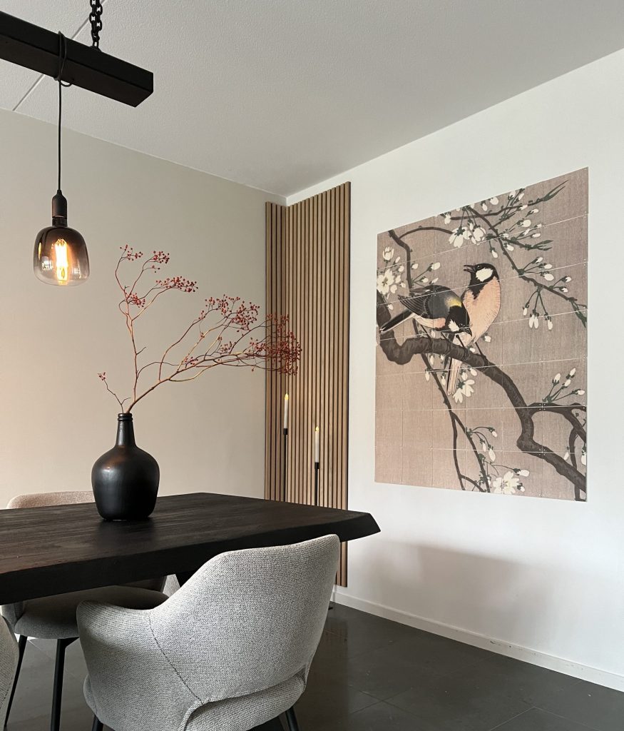Classic oak, black felt installed in a corner in a dining room